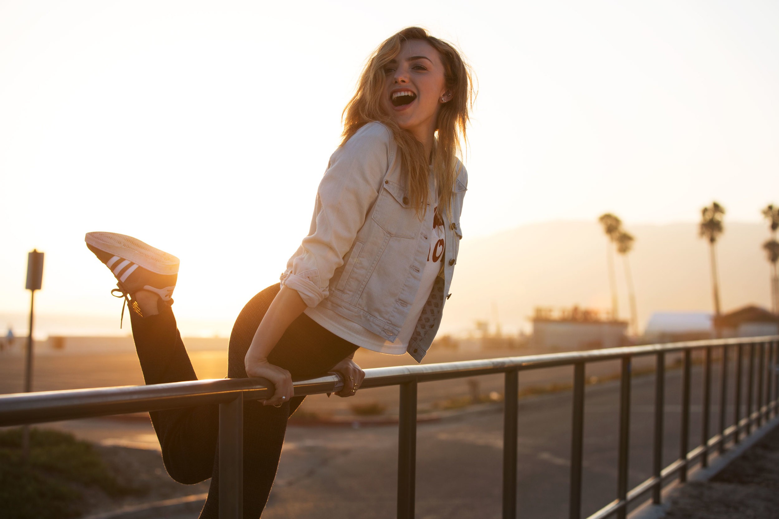 Women Model Brunette Long Hair Women Outdoors Sneakers Jean Jacket Laughing Fence Palm Trees Urban R 2500x1667