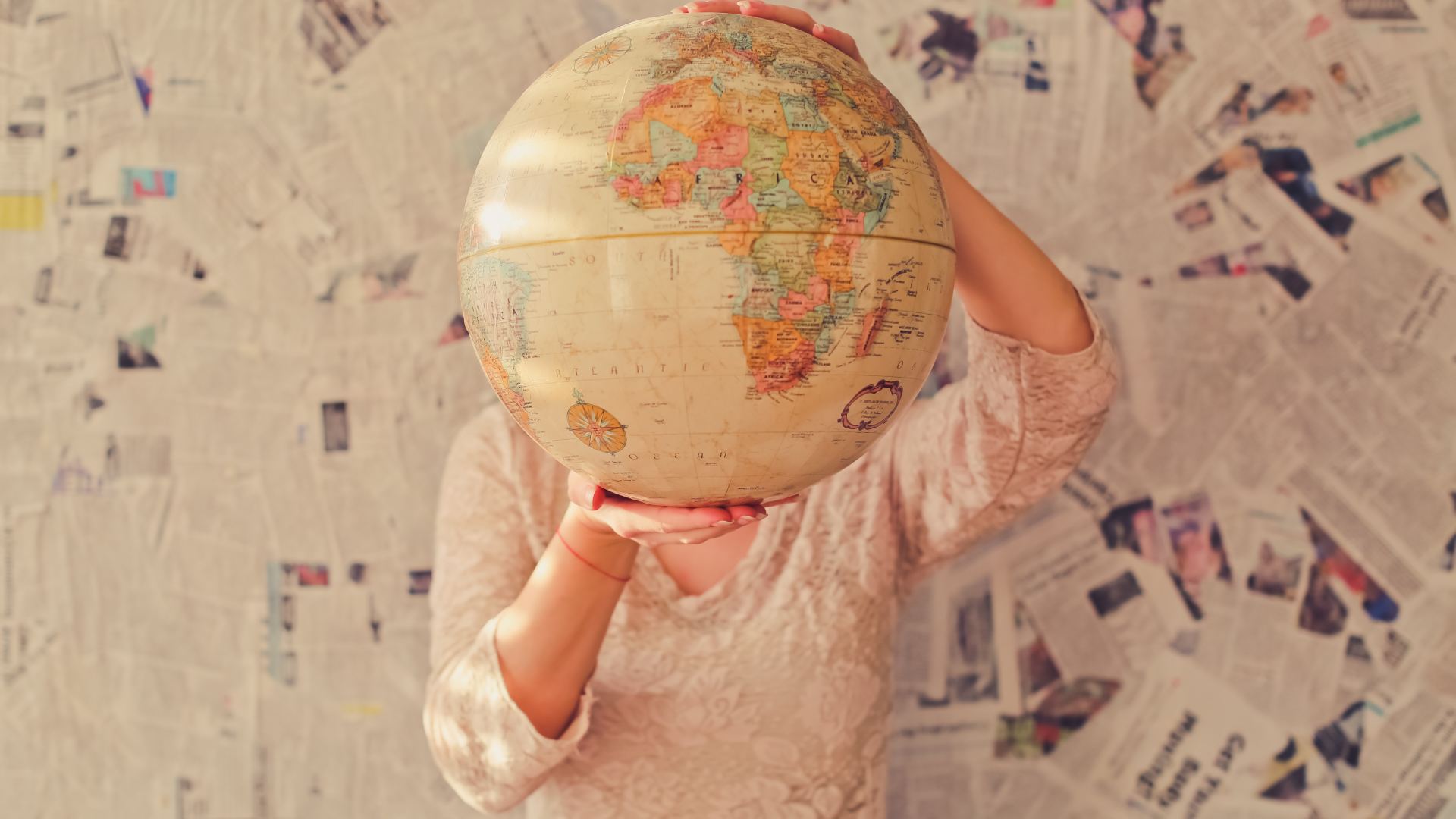 Globes Continents Map Countries Women Depth Of Field Newspapers Hands Africa Wall Frontal View 1920x1080