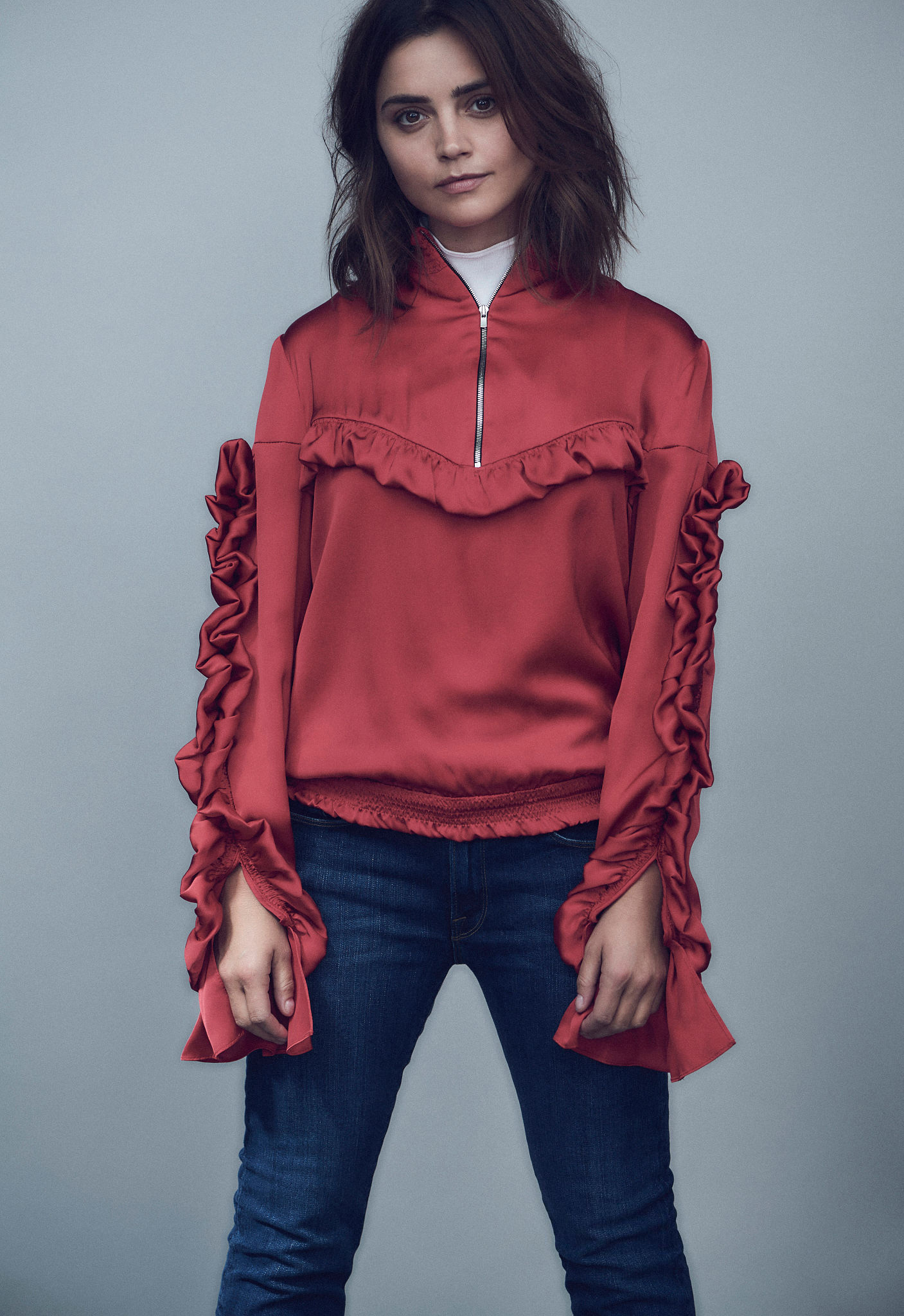 Jenna Coleman Actress Women Actress Brunette Jeans Simple Background Blue Background Red Shirt 1407x2048