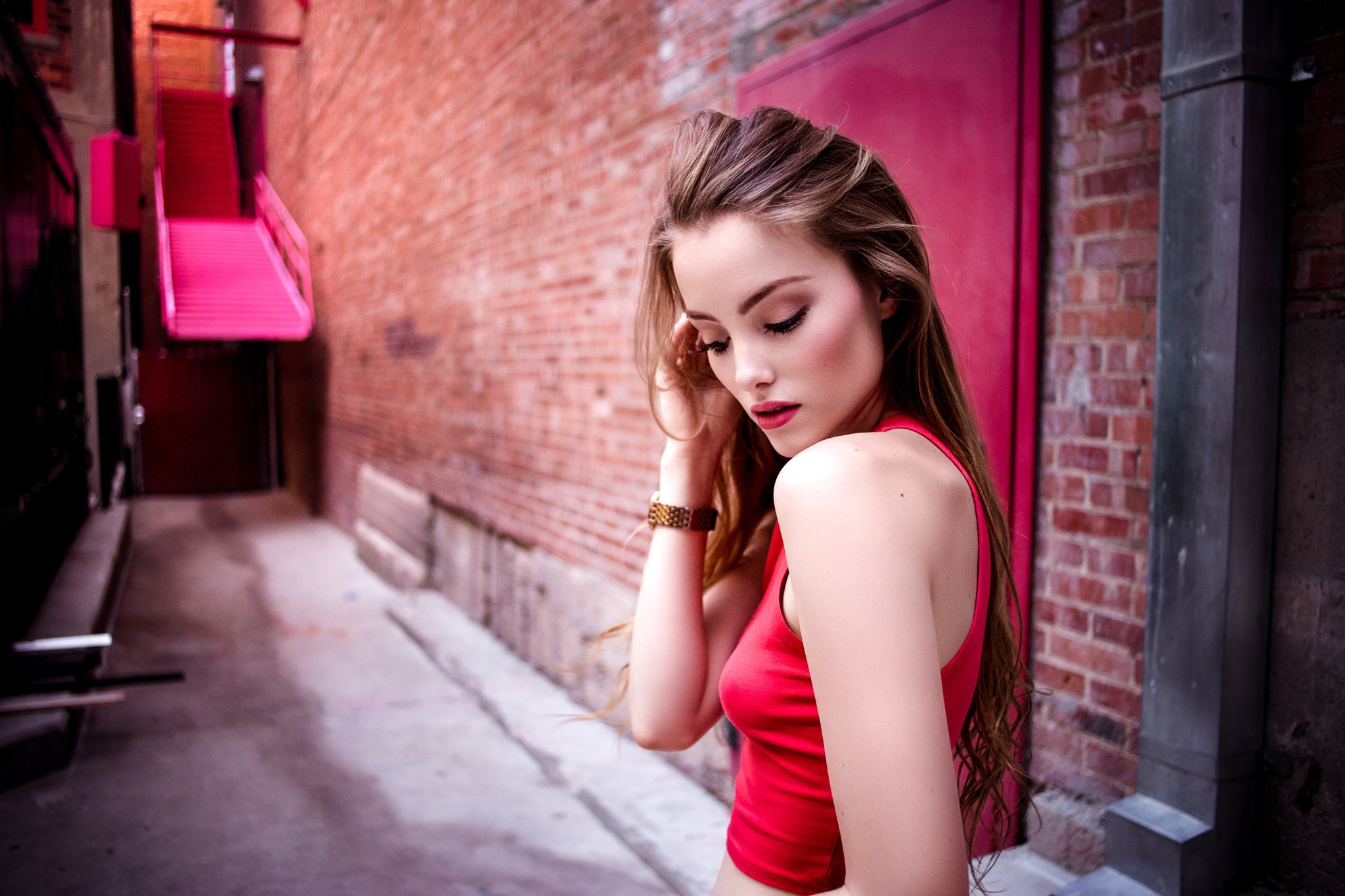 Women April Alleys Portrait April Slough Young Woman One Arm Up Red Tops Looking Below 2048x1365