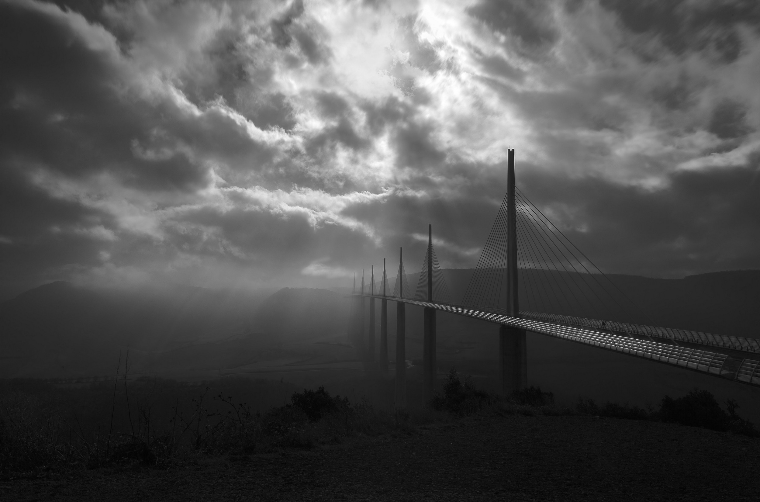Landscape Nature Viaduct Bridge Architecture Sun Rays Clouds Daylight France Monochrome Mist Millau  2500x1651