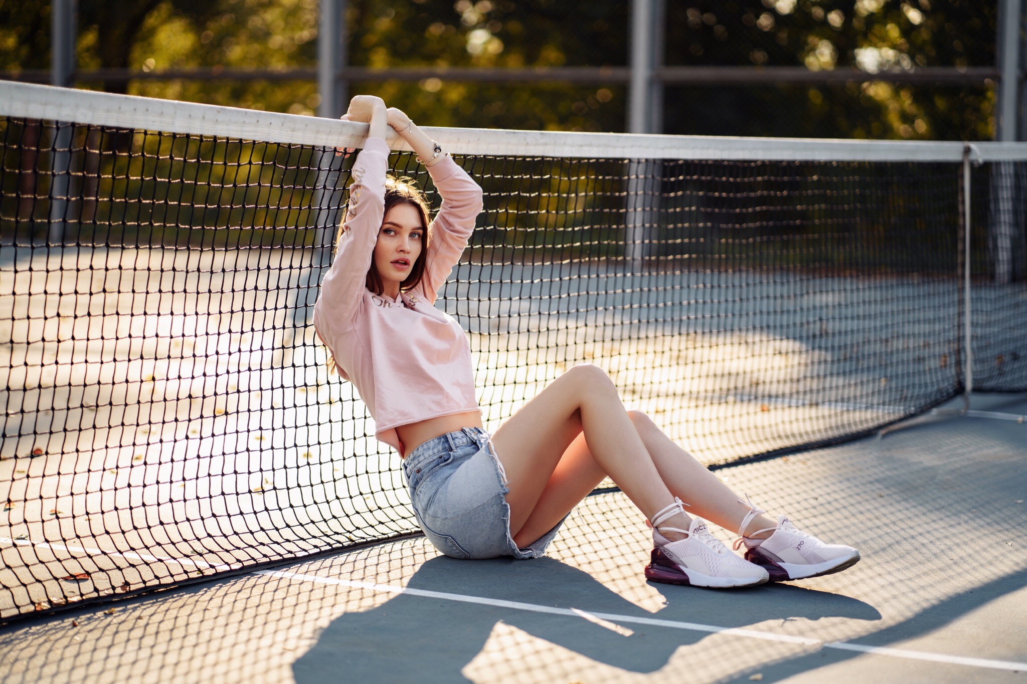 Women Sneakers Sitting Denim Skirt Women Outdoors Looking At Viewer Tennis Court Arms Up Brunette 2048x1365