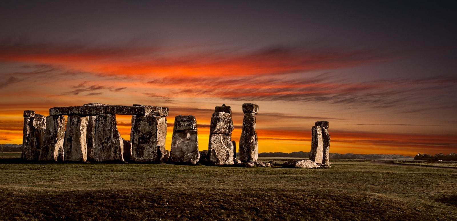Nature Landscape Fire Stones Sunset Stonehenge Monuments England Prehistoric Field Clouds Yellow Red 1600x773