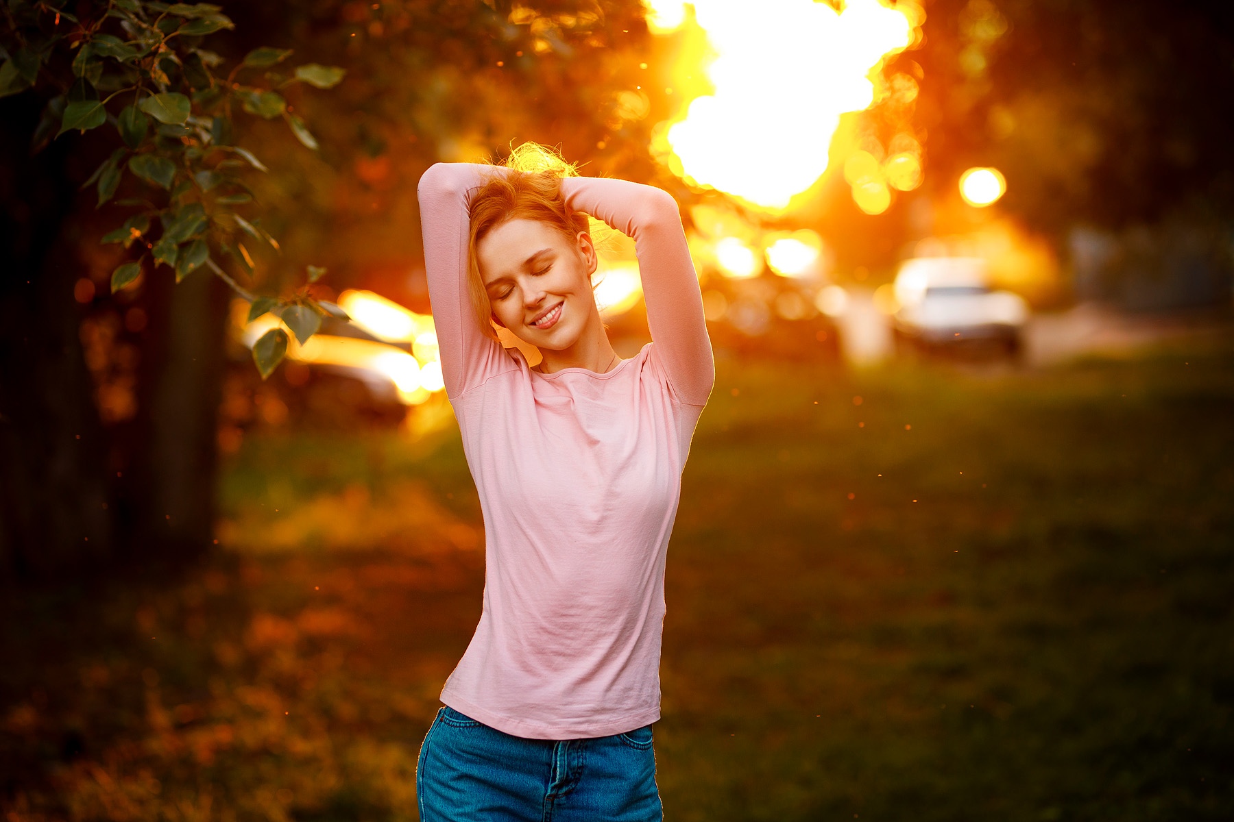 Maria Amelina Women Model Blonde Hands On Head Closed Eyes Smiling Pink Tops Jeans Bokeh Sunset Lens 1800x1200