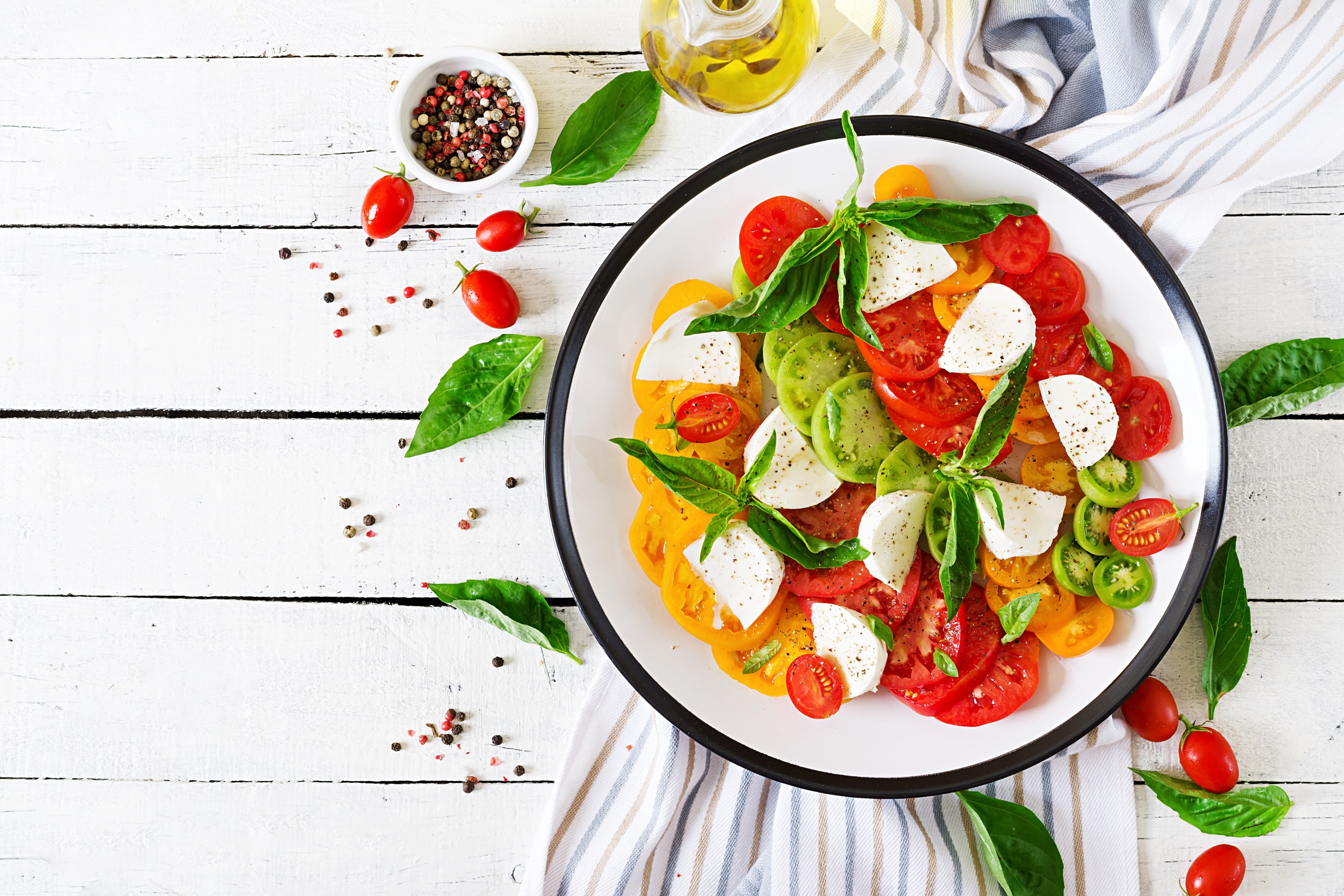 Food Salad Tomatoes Basil Mozzarella Black Pepper Spice Olive Oil Plates Wooden Surface Cheese 2560x1707
