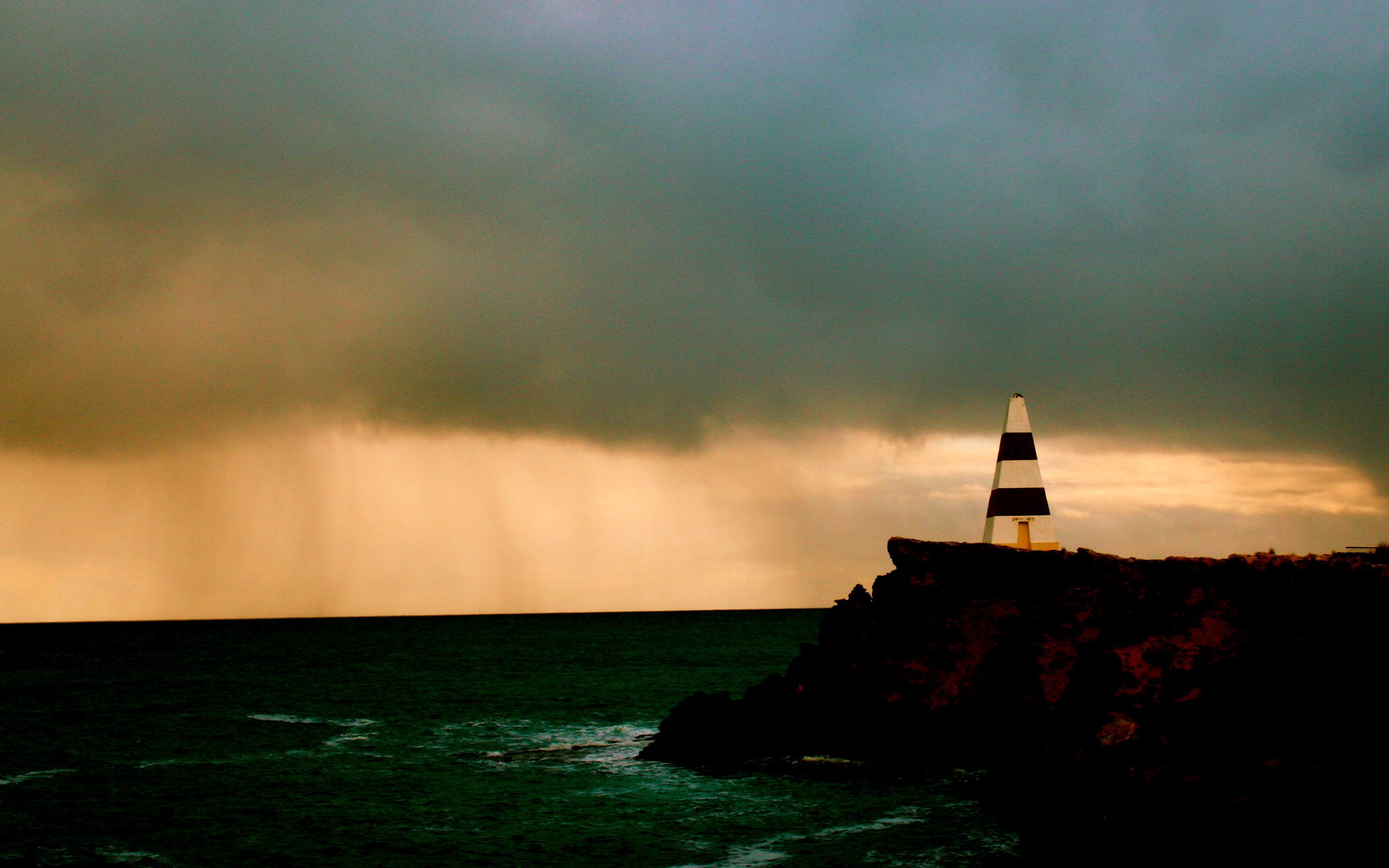 Obelisk Sea Sky Clouds Landscape 2560x1600