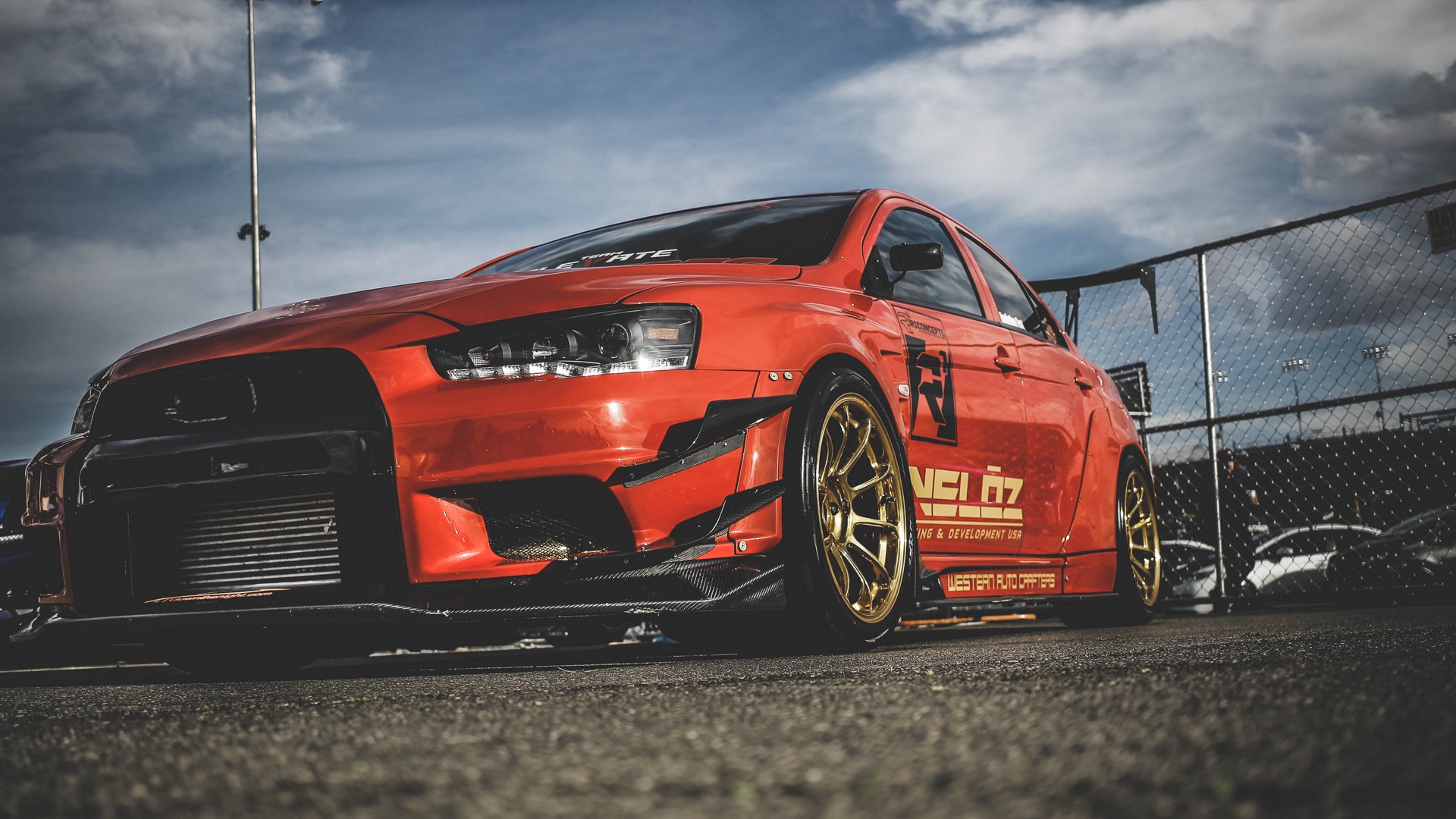 Mitsubishi Mitsubishi Lancer Evo X Sports Car Red Cars Car Vehicle Low Angle Colored Wheels 1920x1080