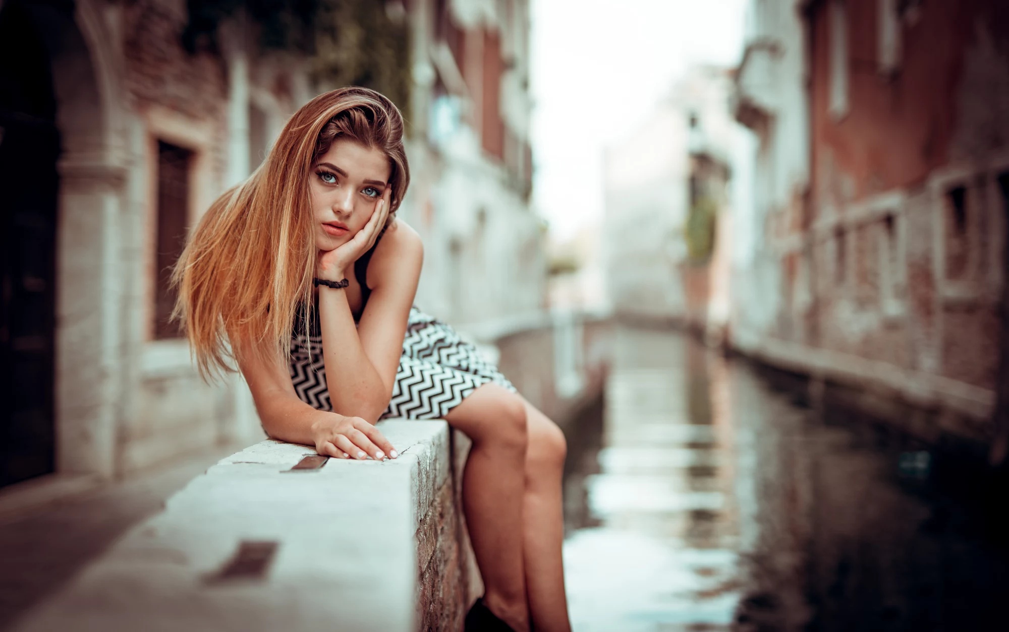 Marco Squassina Women Model Sitting Long Hair Brunette Urban Riverside Looking At Viewer 2000x1254