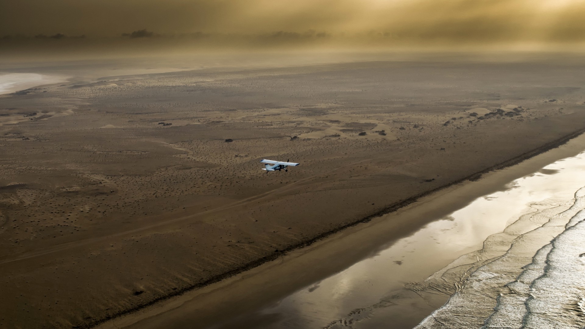 Nature Landscape Sea Water Horizon Waves Coast Airplane Flying Sun Rays Mist Morocco Africa Aerial V 1920x1080