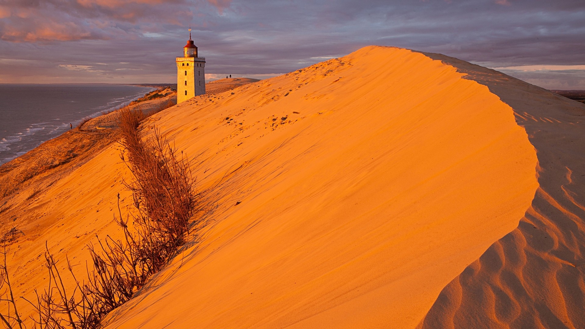 Nature Sand Landscape Dunes Lighthouse Water Sea Clouds Hills Plants Sunlight Waves Desert Denmark 1920x1080