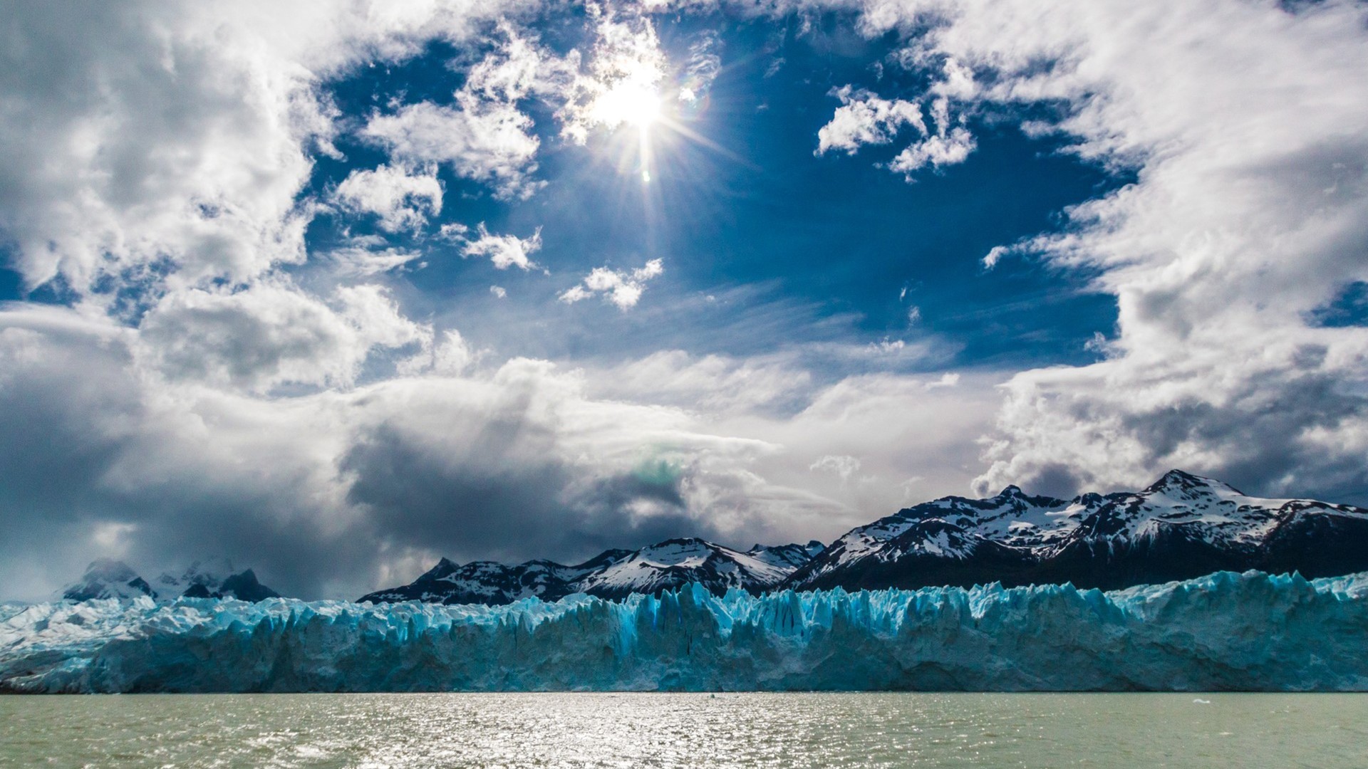 Nature Landscape Water Sea Sun Clouds Mountains Ice Iceberg Sky Snowy Peak Glaciers 1920x1080