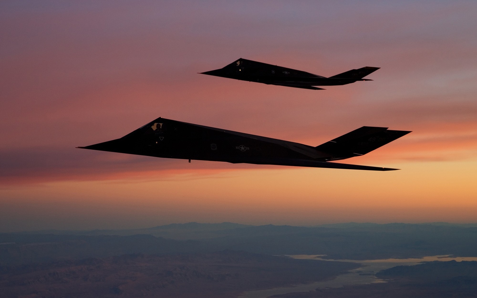 F 117 Nighthawk Aircraft Stealth Military Aircraft Sunset US Air Force Strategic Bomber 2000x1250