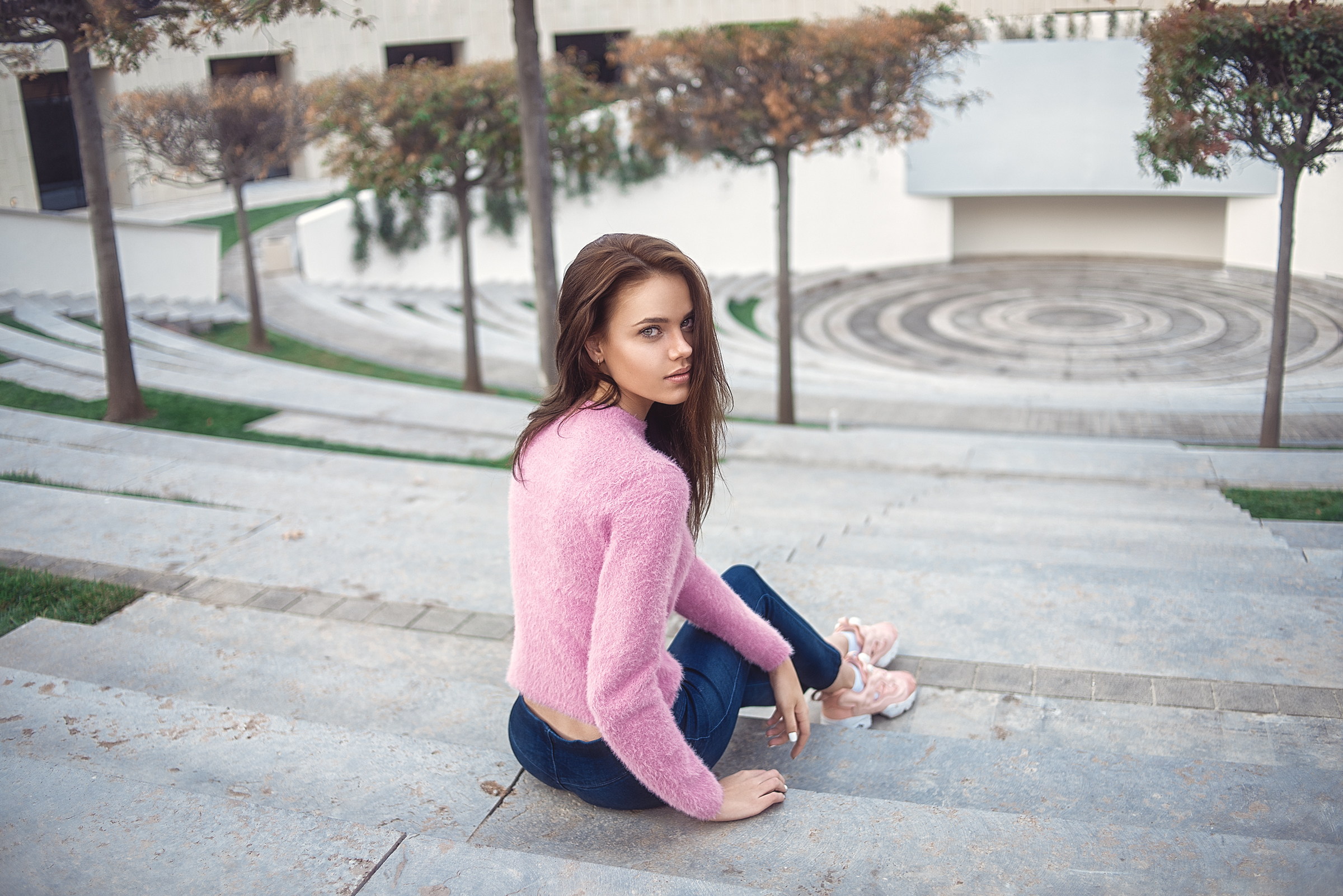 Women Portrait Women Outdoors Jeans Sitting Sneakers Depth Of Field Stairs Pink Sweater Looking Back 2400x1602