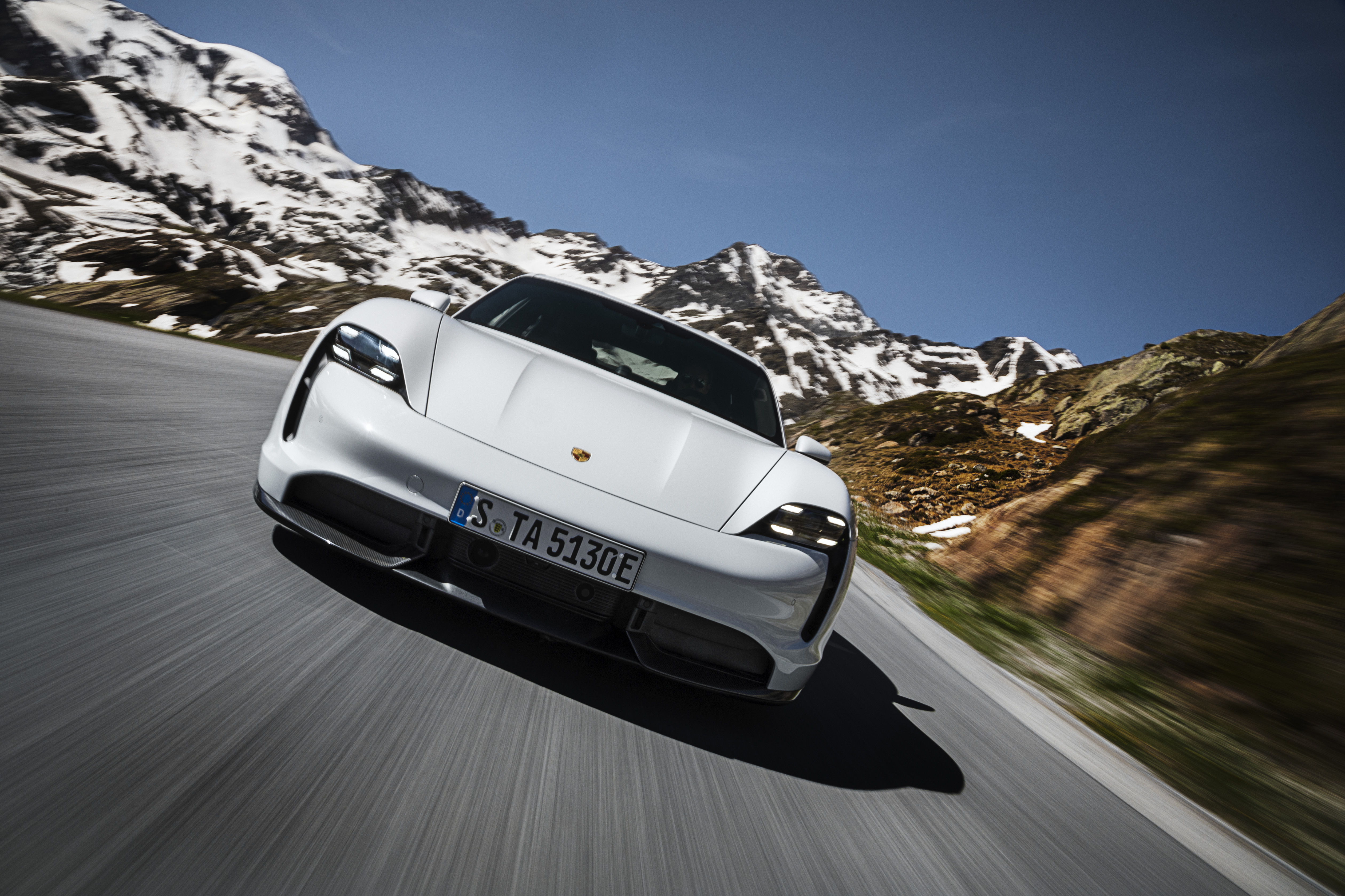 Porsche Taycan Electric Car Frontal View Dutch Tilt Snow Road Motion Blur 5040x3360