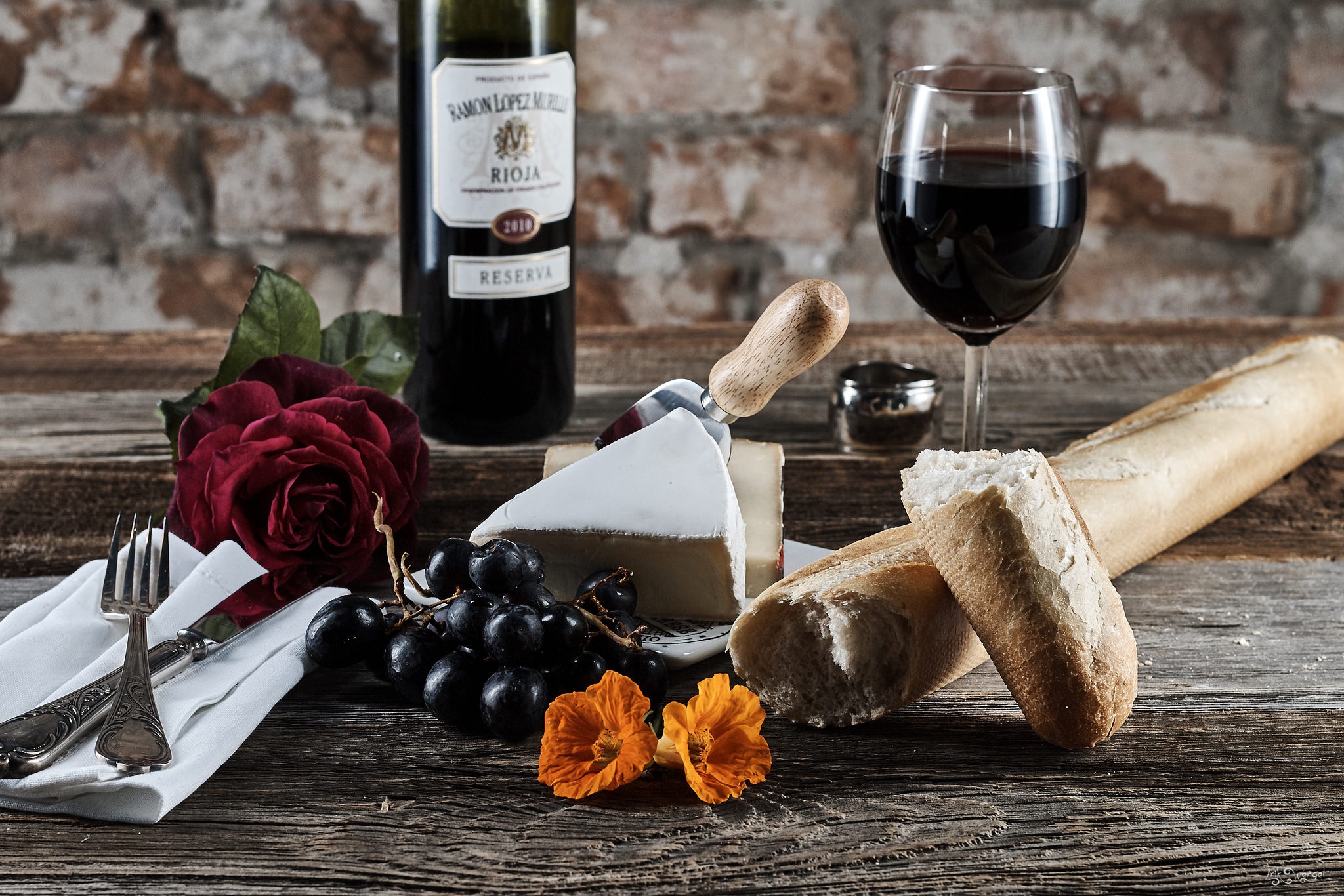 Still Life Food Wine Bread Grapes Cheese Rose Flowers Knife Fork Napkin Wooden Surface 2048x1366