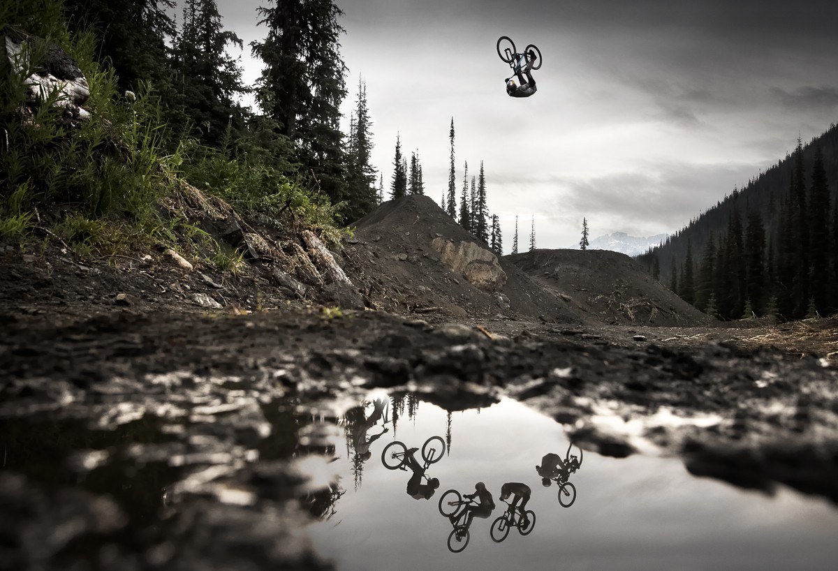 Nature Landscape Men Sports Bicycle Mountain Bikes Jumping Water Puddle Mud Trees Forest Hills Photo 1200x818