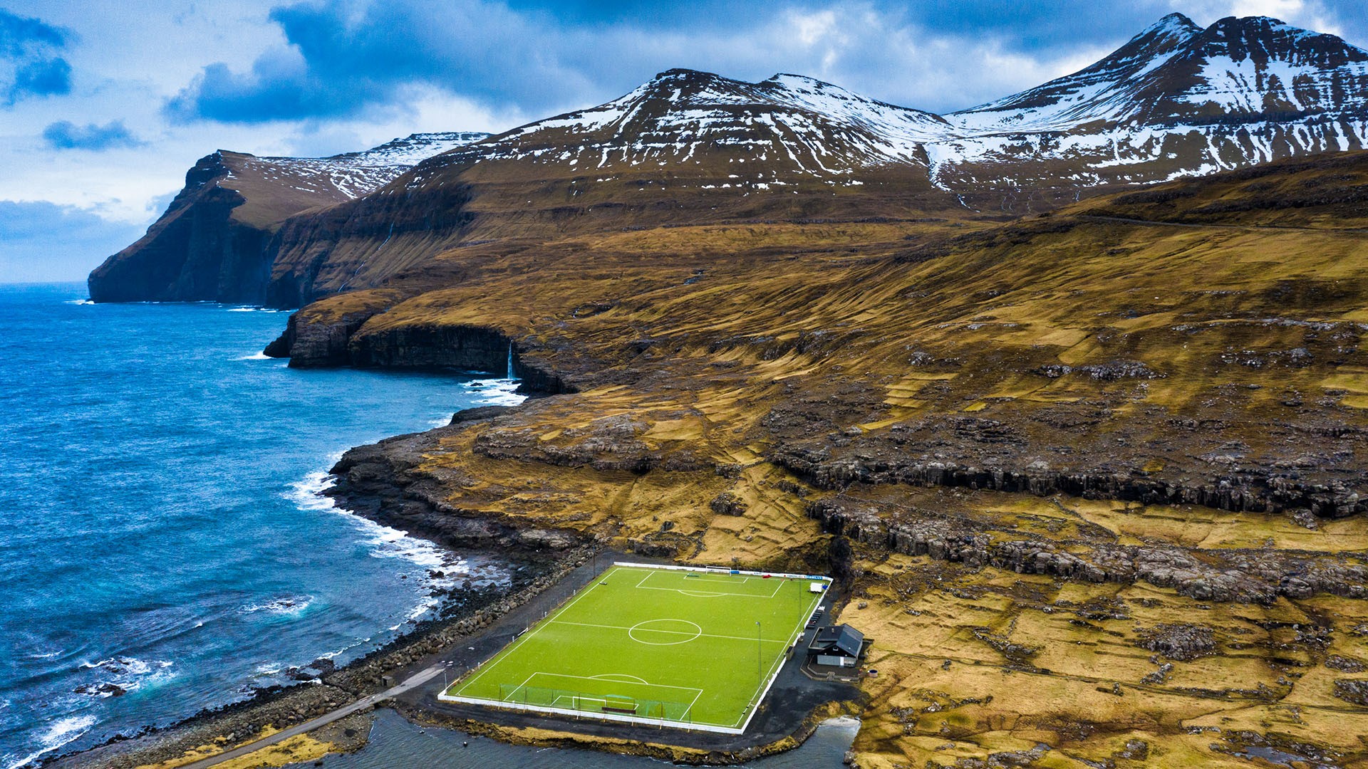 Nature Landscape Sea Water Field Rocks Mountains Soccer Field People Coast Faroe Islands Denmark Gra 1920x1080