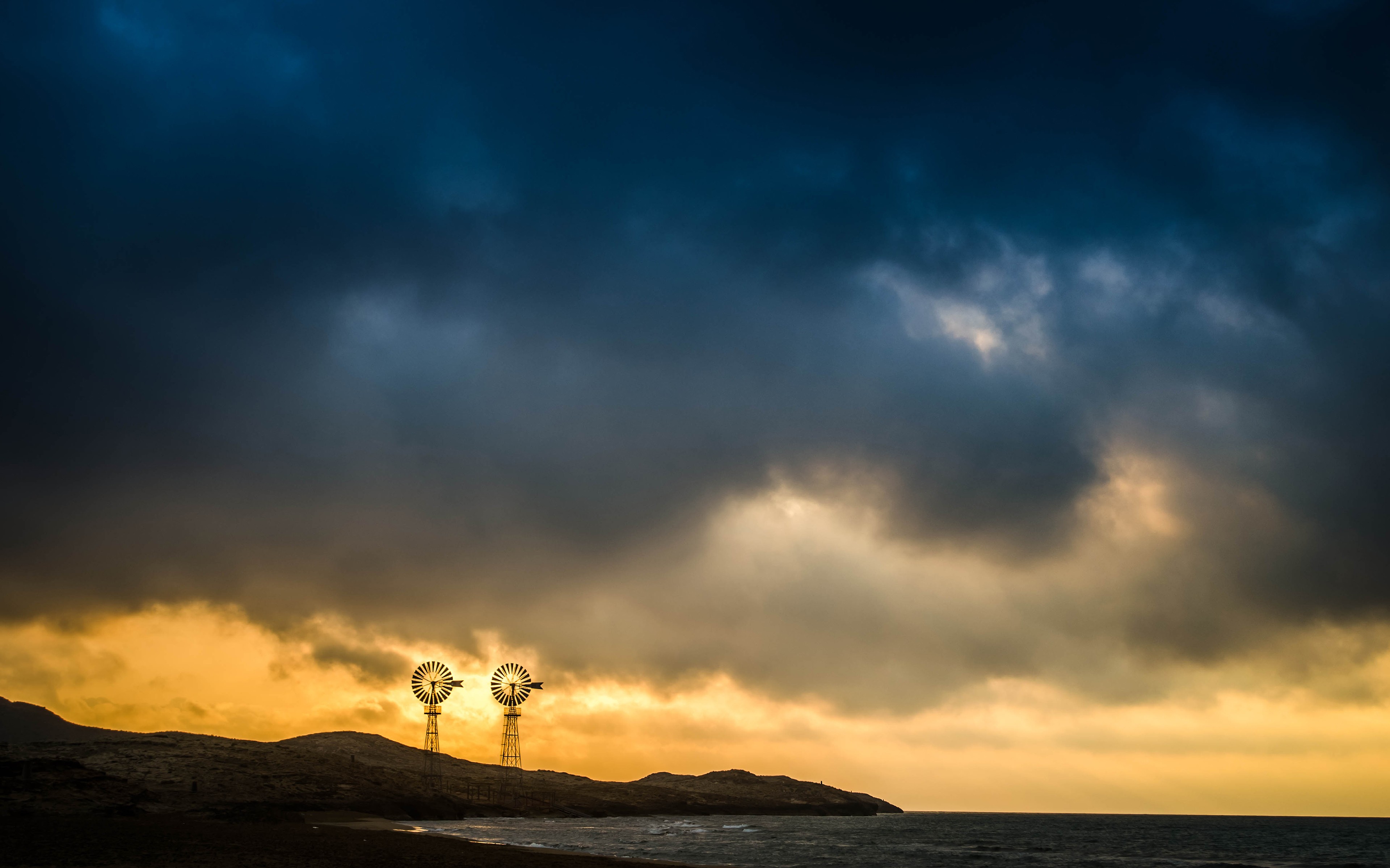 Coast Sea Windmill Clouds Wind Farm Overcast Yellow Sunset Shore Horizon 3840x2400